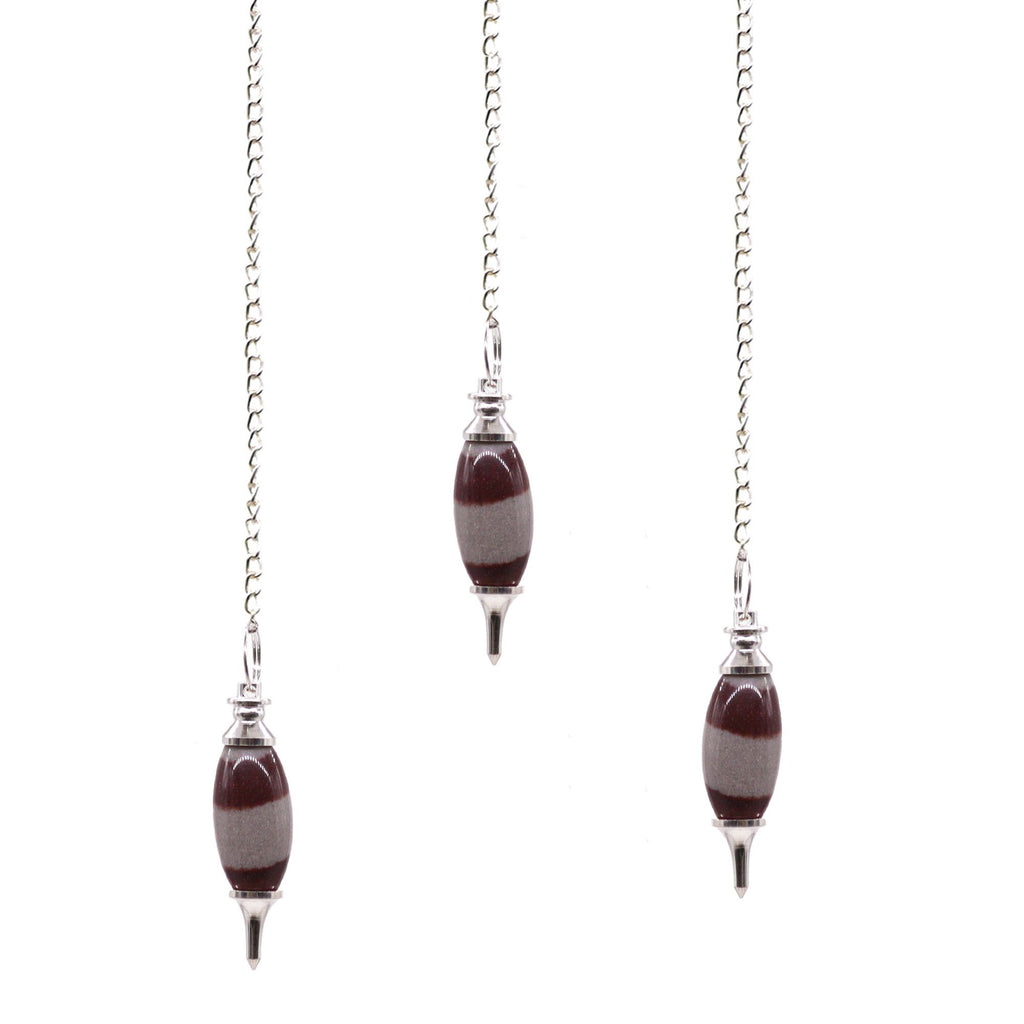 Shiva Lingam inga kristályheggyel
