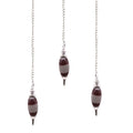 Shiva Lingam inga kristályheggyel
