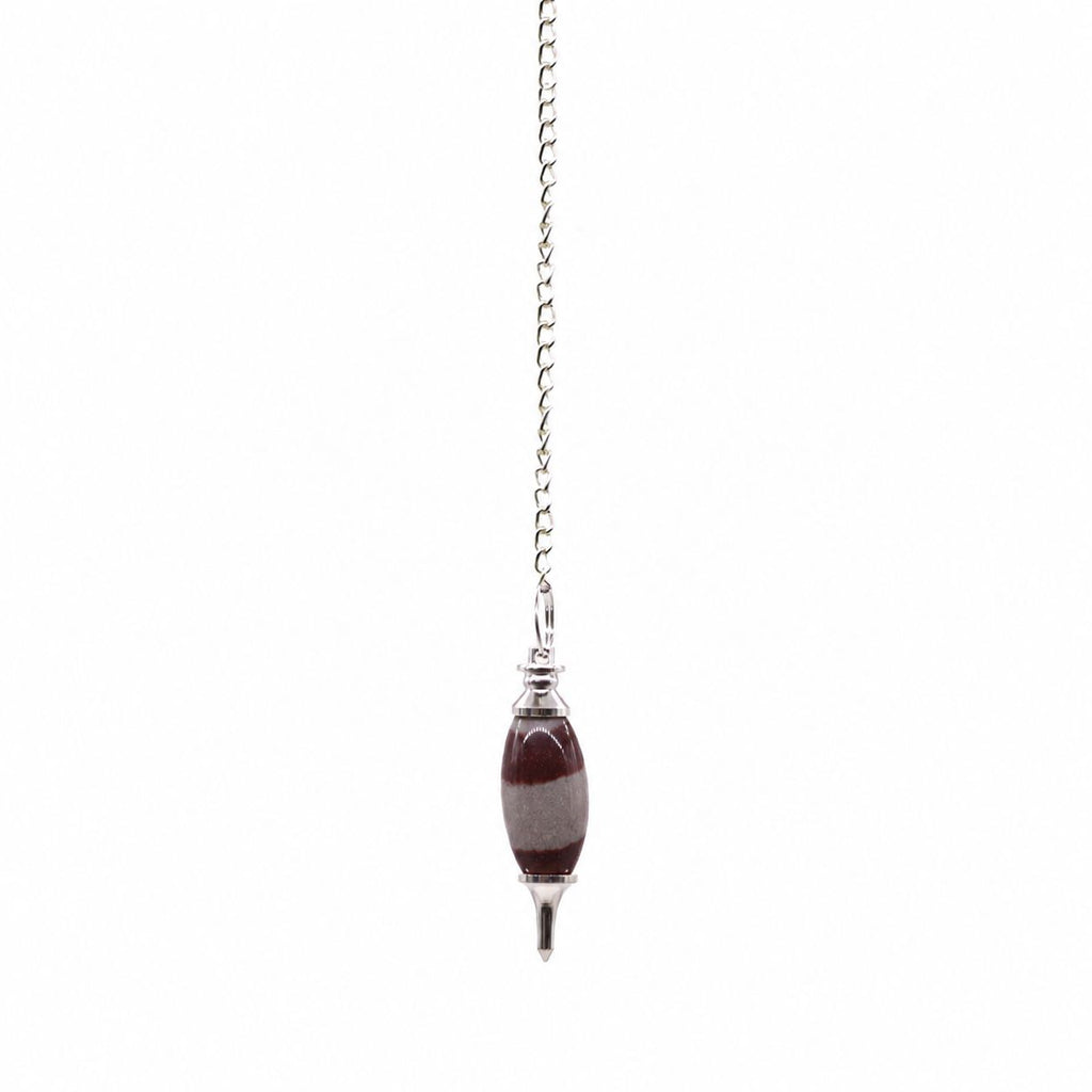 Shiva Lingam inga kristályheggyel